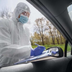 Professional forensic cleaners performing inspection