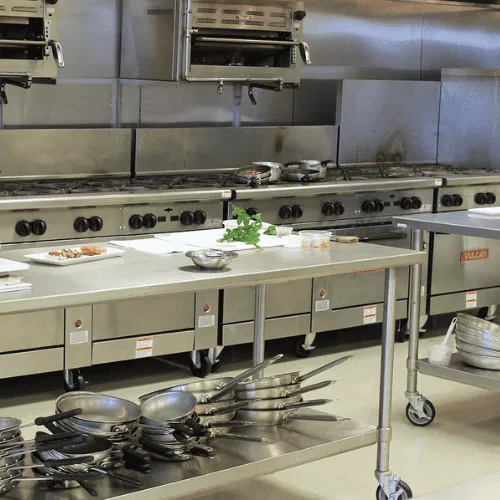 AllAces technician deep cleaning a commercial kitchen.