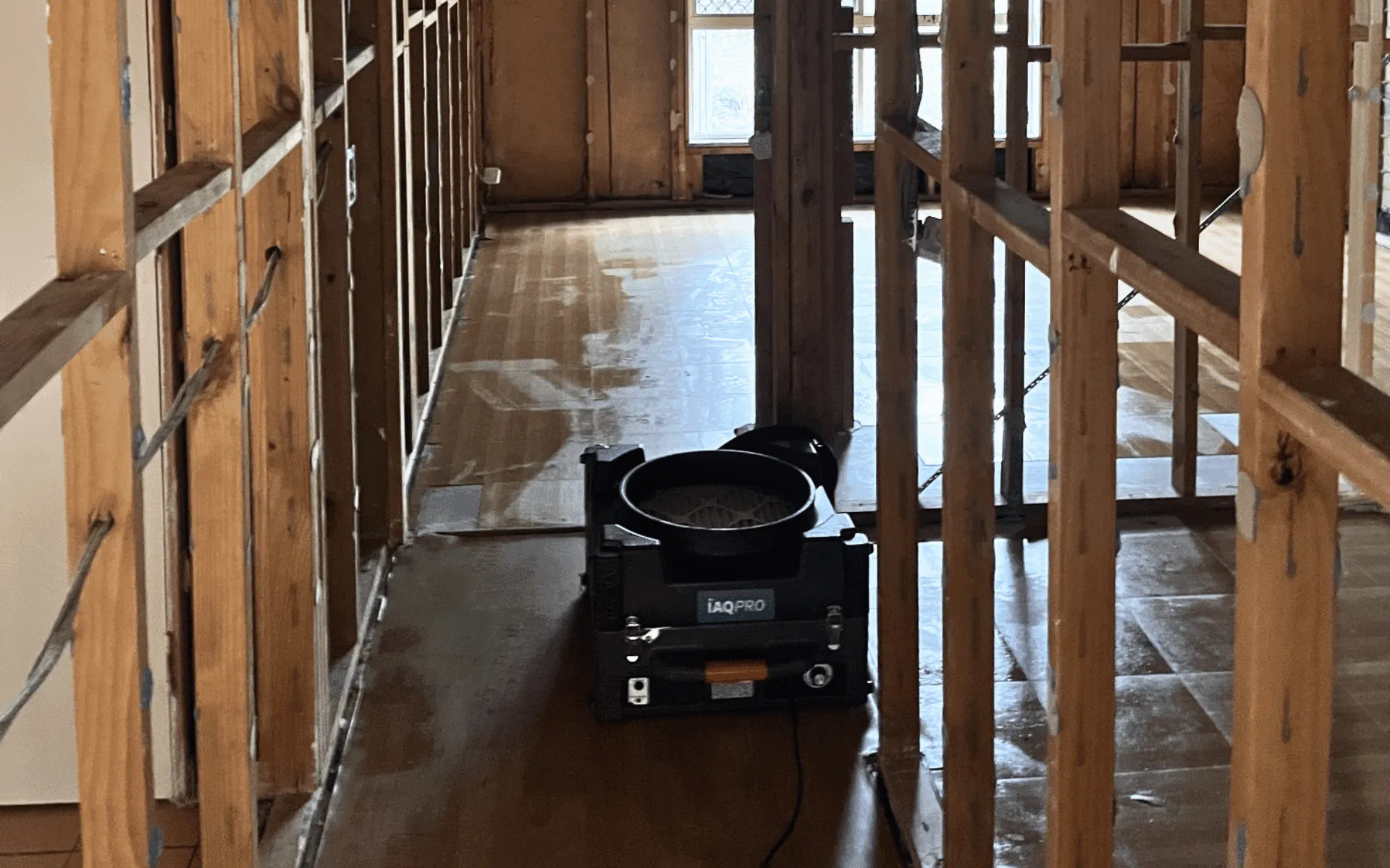 IAQ Pro air scrubber being used by All Aces for structural drying and indoor air quality control during meth decontamination project.