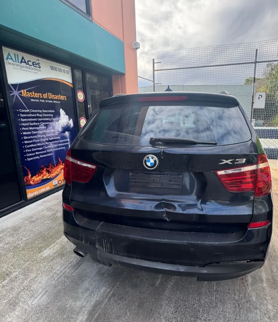 A car parked in AllAces Depot to receive vehicle decontamination Sydney treatments for chemical contaminants